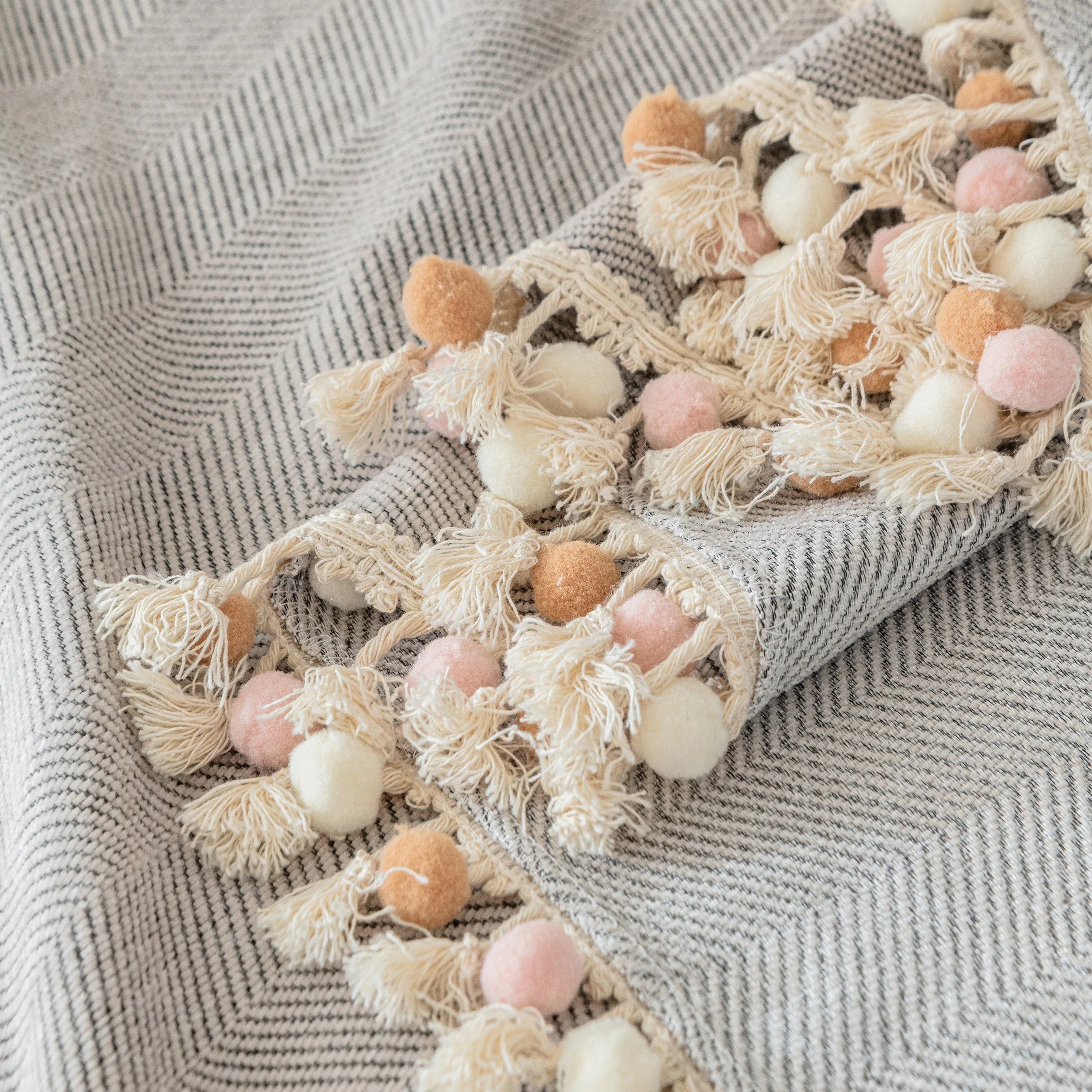Boho Herringbone Sofa Throw Blanket with Pom Pom Tassels Stylish Furniture Slipcover - TaroTextile